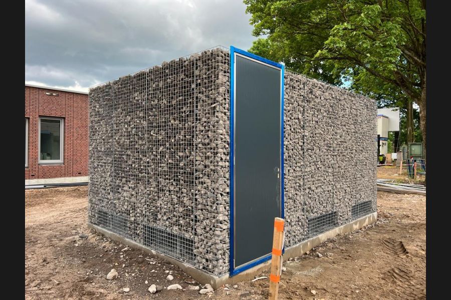Schanskorven ombouw voor warmtepomp installatie Schanskorven ombouw